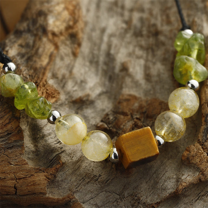 Pulsera de cuerda de la paz con Buddha Stones " Encuentra tu alegría", peridoto, citrino y ojo de tigre