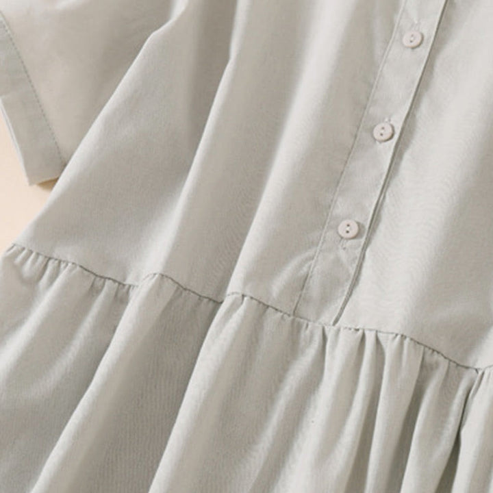 Vestido midi de lino y algodón de manga corta con diseño de botones de verano y bolsillos de Buddha Stones