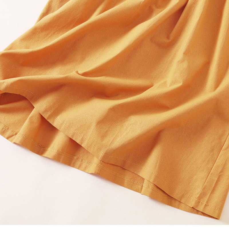 Vestido midi de lino y algodón de manga corta con diseño de botones de verano y bolsillos de Buddha Stones