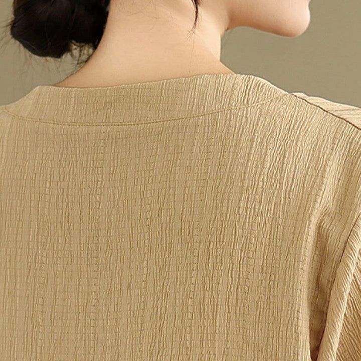 Camiseta de verano informal con cuello en V y mangas abullonadas de Buddha Stones para mujer