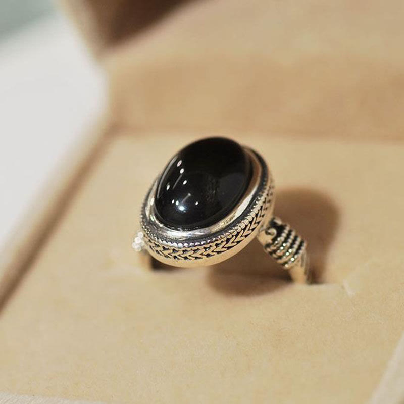 Anillo de protección ajustable de ónix negro natural con Buddha Stones