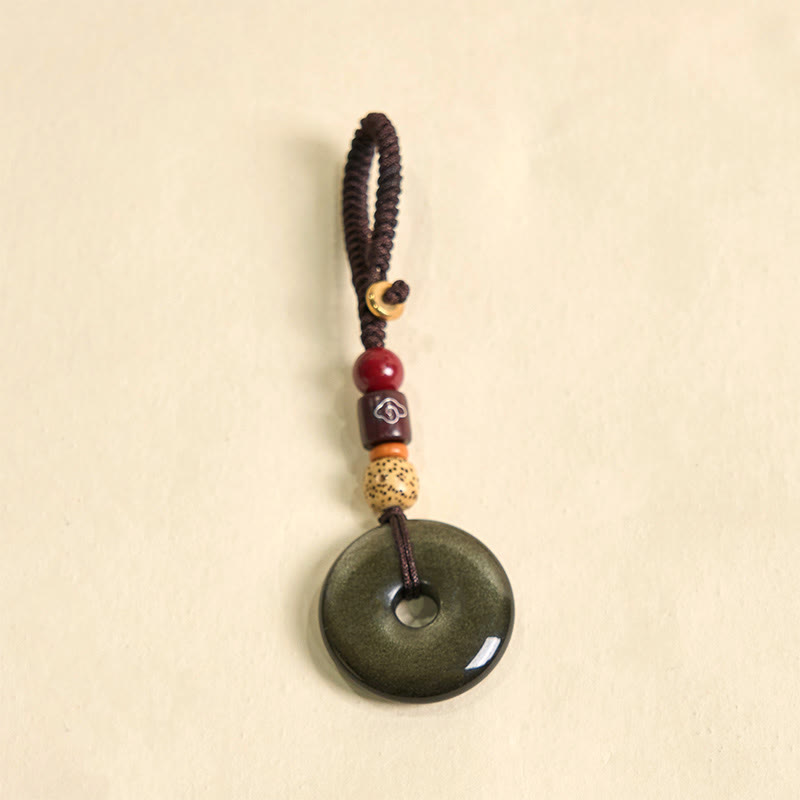 Llavero reforzado con hebilla de paz de obsidiana con brillo dorado natural y Buddha Stones