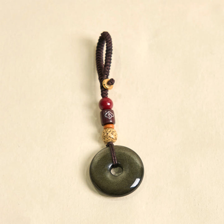 Llavero reforzado con hebilla de paz de obsidiana con brillo dorado natural y Buddha Stones