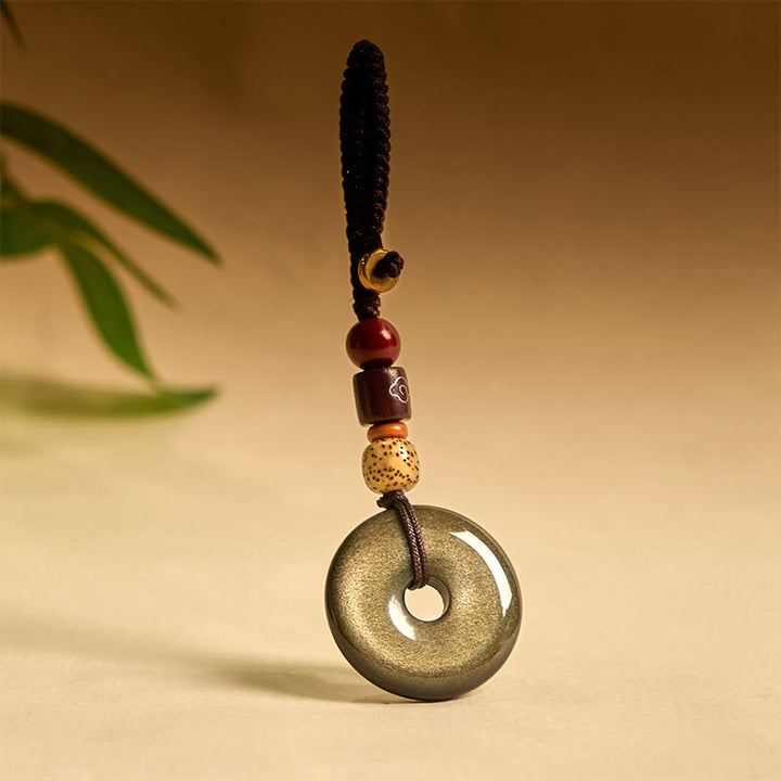 Llavero reforzado con hebilla de paz de obsidiana con brillo dorado natural y Buddha Stones