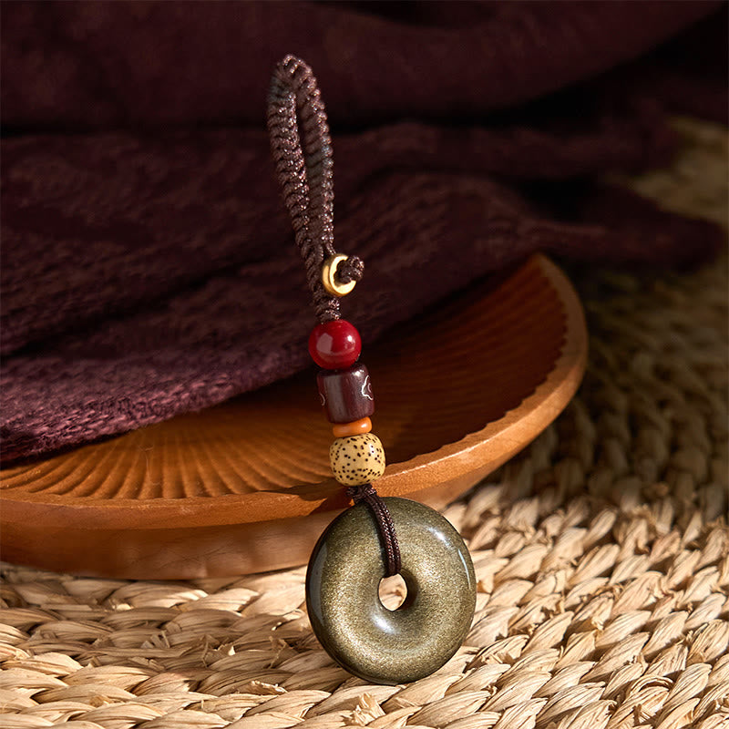 Llavero reforzado con hebilla de paz de obsidiana con brillo dorado natural y Buddha Stones
