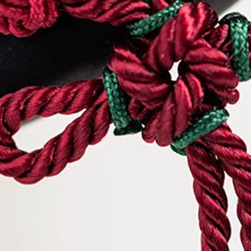 Horquilla protectora con borlas de nudo chino de hilo rojo y ébano con Buddha Stones