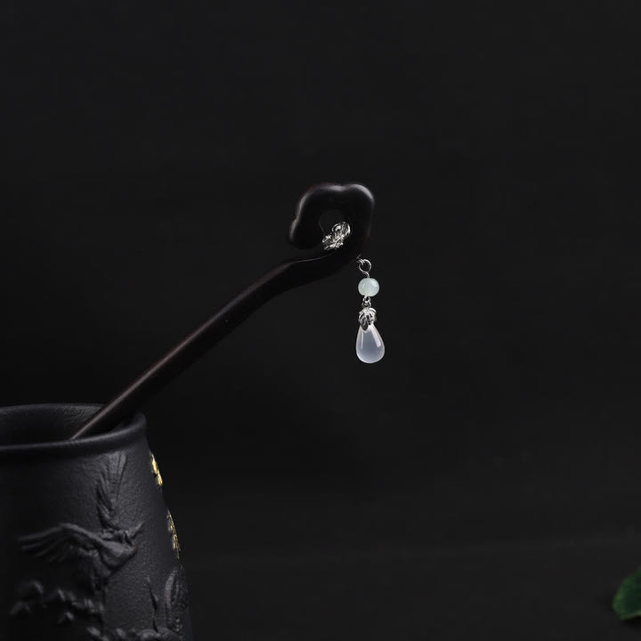 Horquilla de coraje de nube auspiciosa de ébano con Buddha Stones