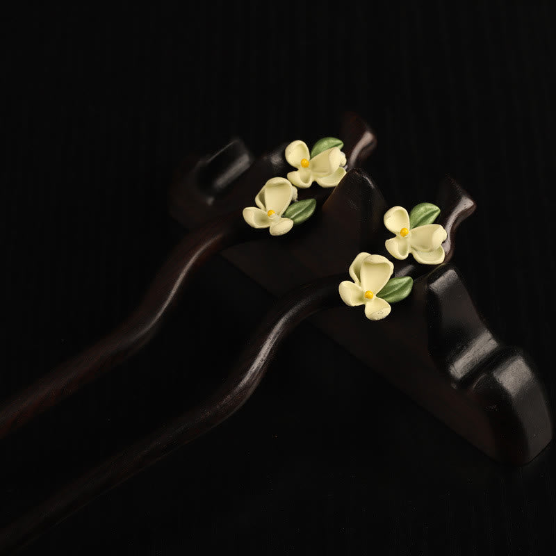 Horquilla con Buddha Stones, ébano, pétalos de gardenia y coraje