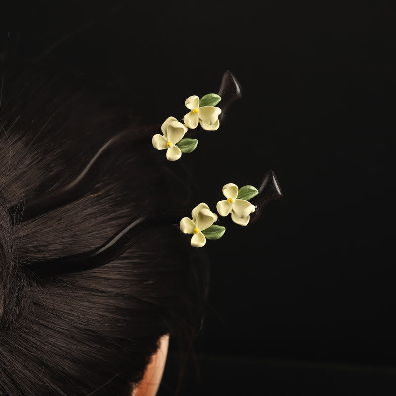 Horquilla con Buddha Stones, ébano, pétalos de gardenia y coraje