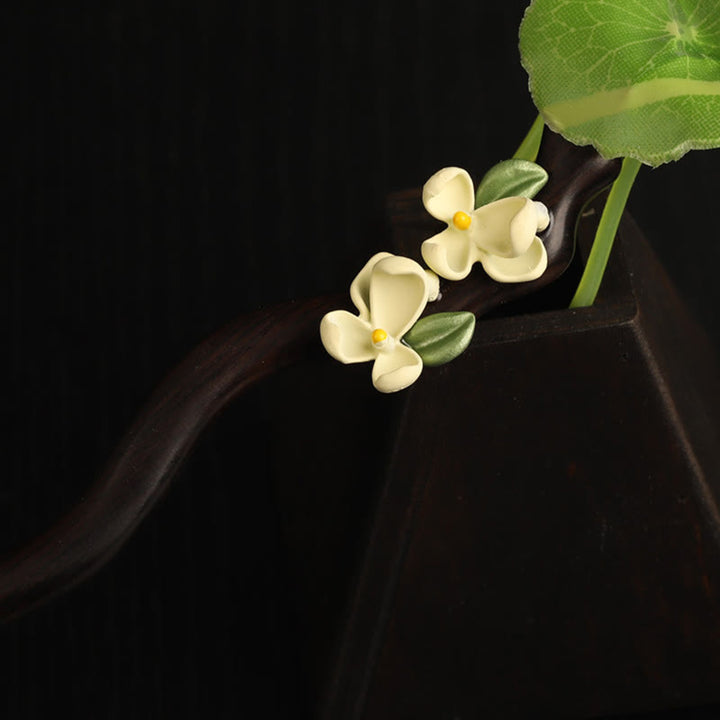 Horquilla con Buddha Stones, ébano, pétalos de gardenia y coraje