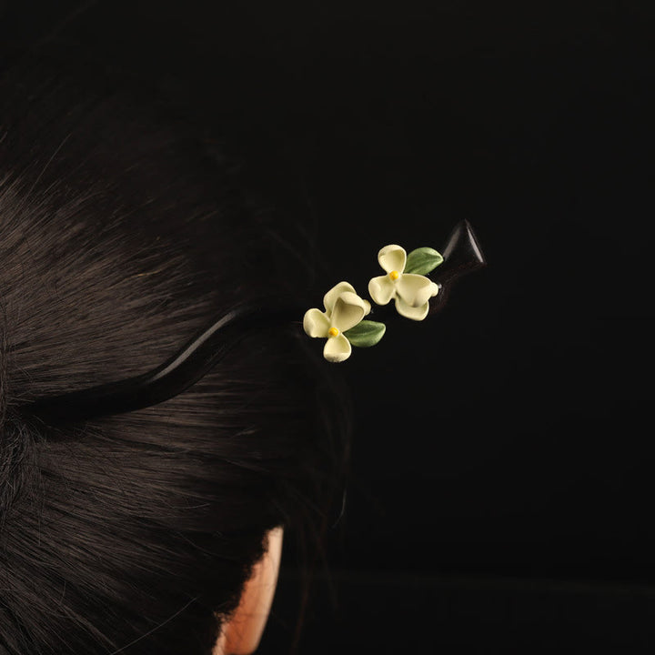 Horquilla con Buddha Stones, ébano, pétalos de gardenia y coraje