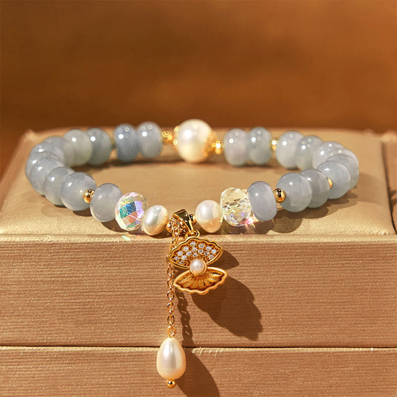 Pulsera de cuentas curativas de concha de perla y aguamarina natural de Buddha Stones