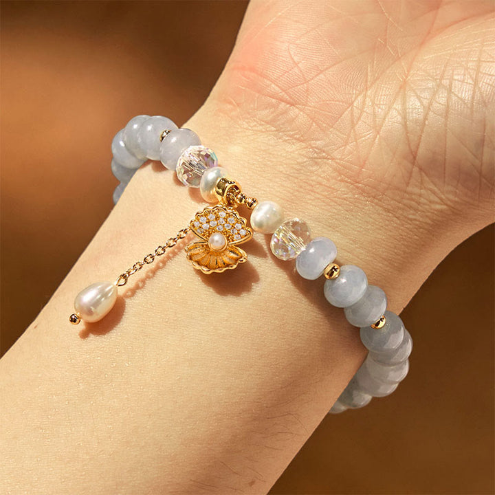 Pulsera de cuentas curativas de concha de perla y aguamarina natural de Buddha Stones