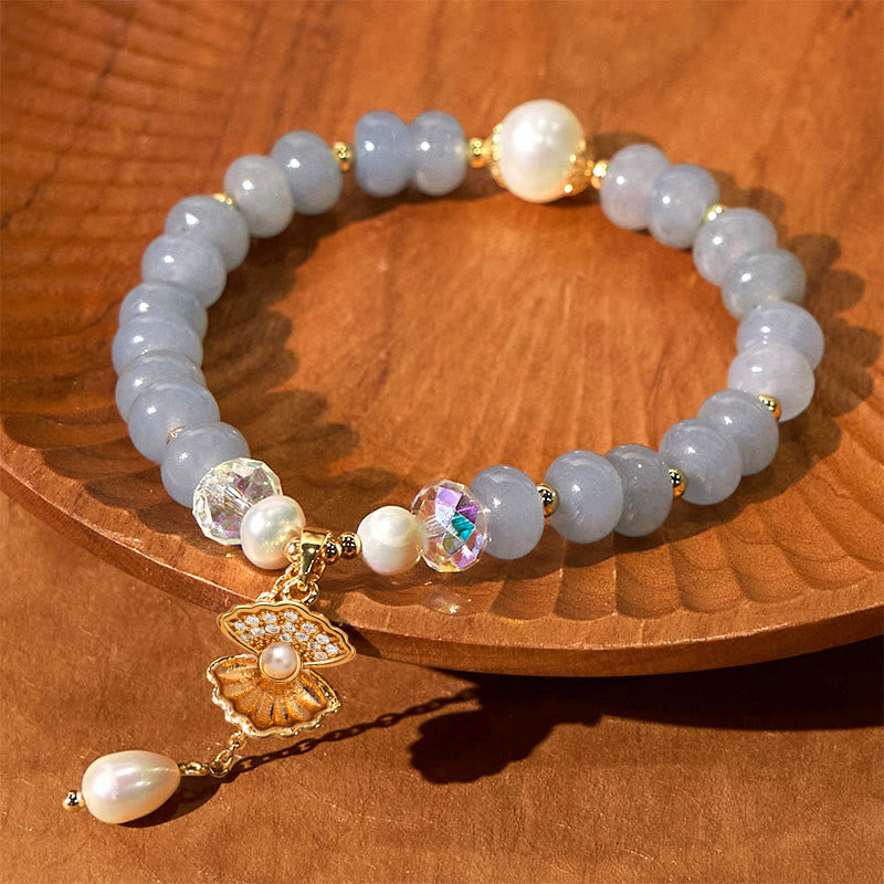 Pulsera de cuentas curativas de concha de perla y aguamarina natural de Buddha Stones