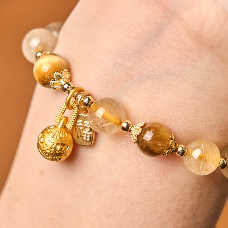 Pulsera de la buena fortuna con Buddha Stones de cuarzo rutilado natural con carácter Fu de metal que traga bestias