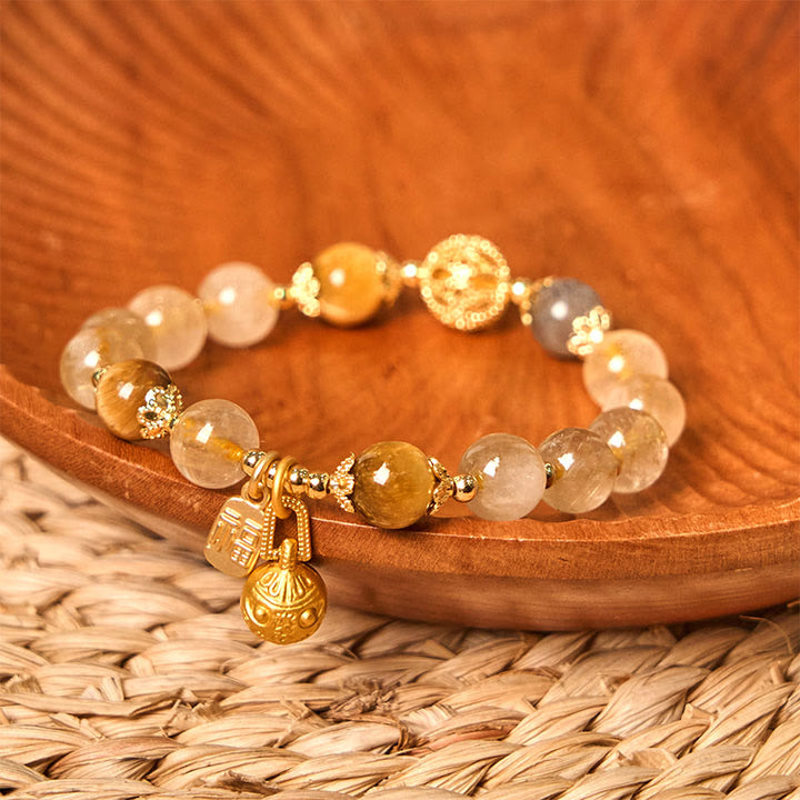 Pulsera de la buena fortuna con Buddha Stones de cuarzo rutilado natural con carácter Fu de metal que traga bestias