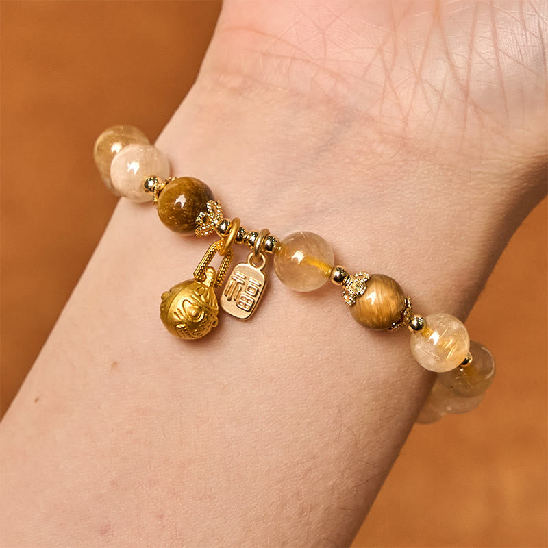 Pulsera de la buena fortuna con Buddha Stones de cuarzo rutilado natural con carácter Fu de metal que traga bestias