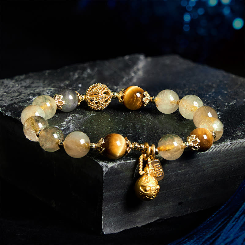 Pulsera de la buena fortuna con Buddha Stones de cuarzo rutilado natural con carácter Fu de metal que traga bestias