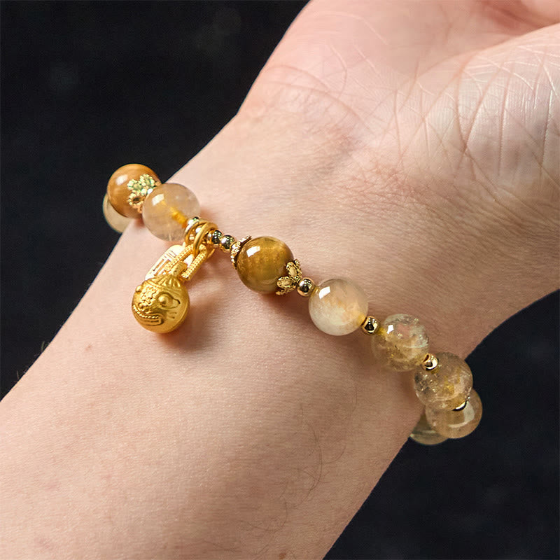 Pulsera de la buena fortuna con Buddha Stones de cuarzo rutilado natural con carácter Fu de metal que traga bestias
