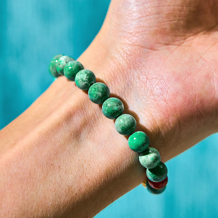 Pulsera de prosperidad con amuleto ciclón Om Mani Padme Hum de jade natural y Buddha Stones