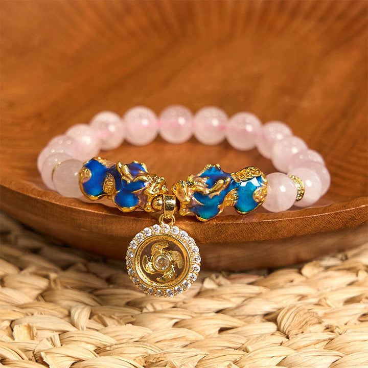 Pulsera cálida con dije de ciclón PiXiu doble que cambia de color con cristales rosas de Buddha Stones