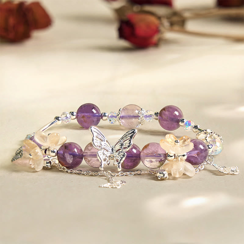 Pulsera de sabiduría con flores de mariposa fantasma moradas naturales y Buddha Stones