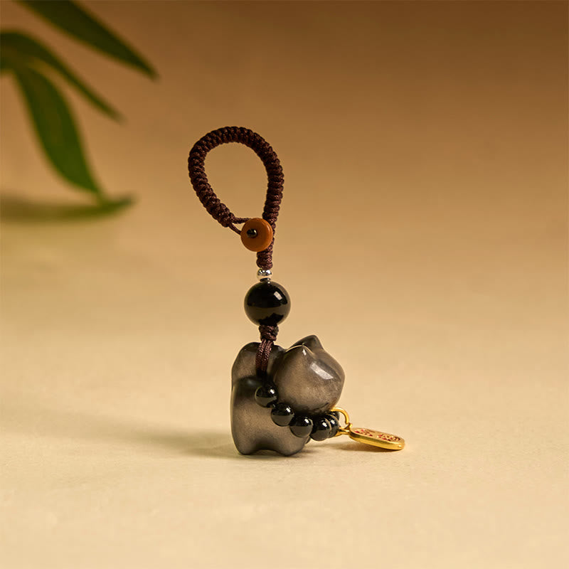 Buddha Stones, obsidiana plateada, obsidiana negra, obsidiana dorada, lindo gato Fu, llavero protector, decoración colgante para teléfono. - Llavero de obsidiana con brillo plateado - image 1