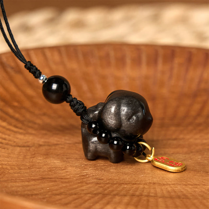 Collar protector con forma de perro Fu de obsidiana plateada con brillo de piedra de Buda, adorno colgante para teléfono