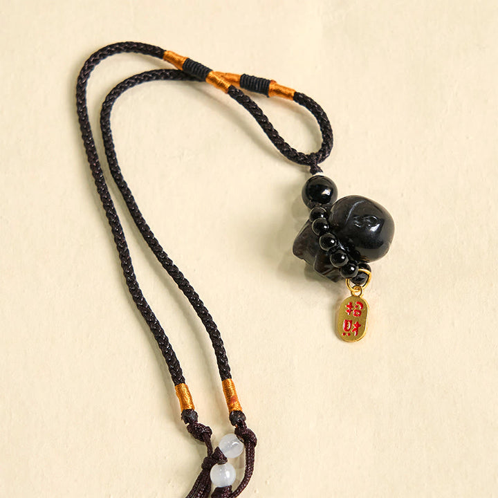 Collar protector con forma de perro Fu de obsidiana plateada con brillo de piedra de Buda, adorno colgante para teléfono