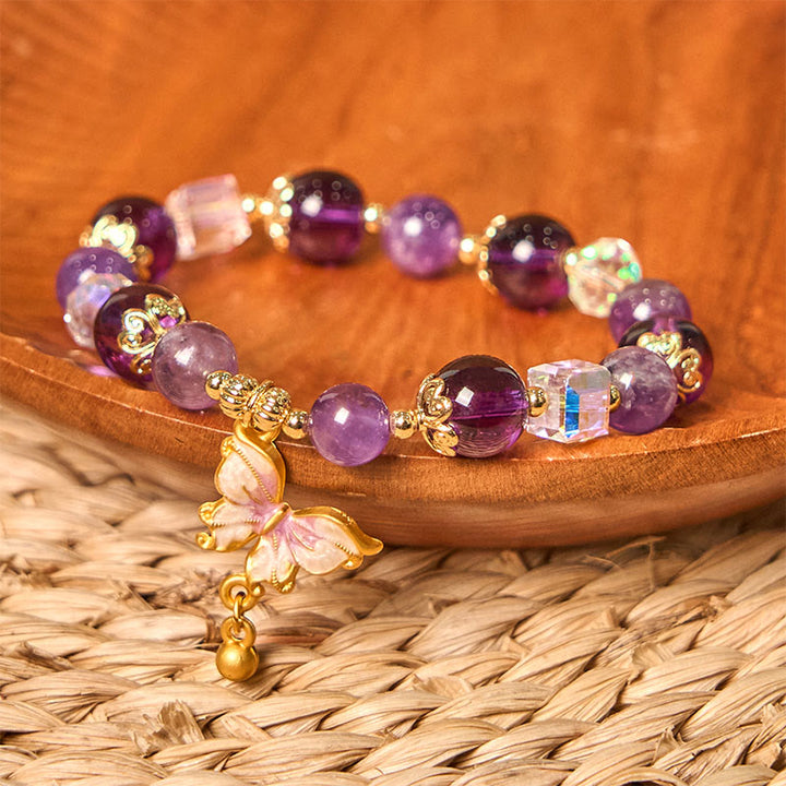 Pulsera de la paz con mariposa y piedra solar de amatista natural de Buddha Stones