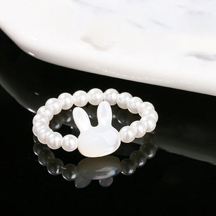 Anillo elástico con cuentas de piedra Tridacna de 3 Buddha Stones y bendición de conejo.
