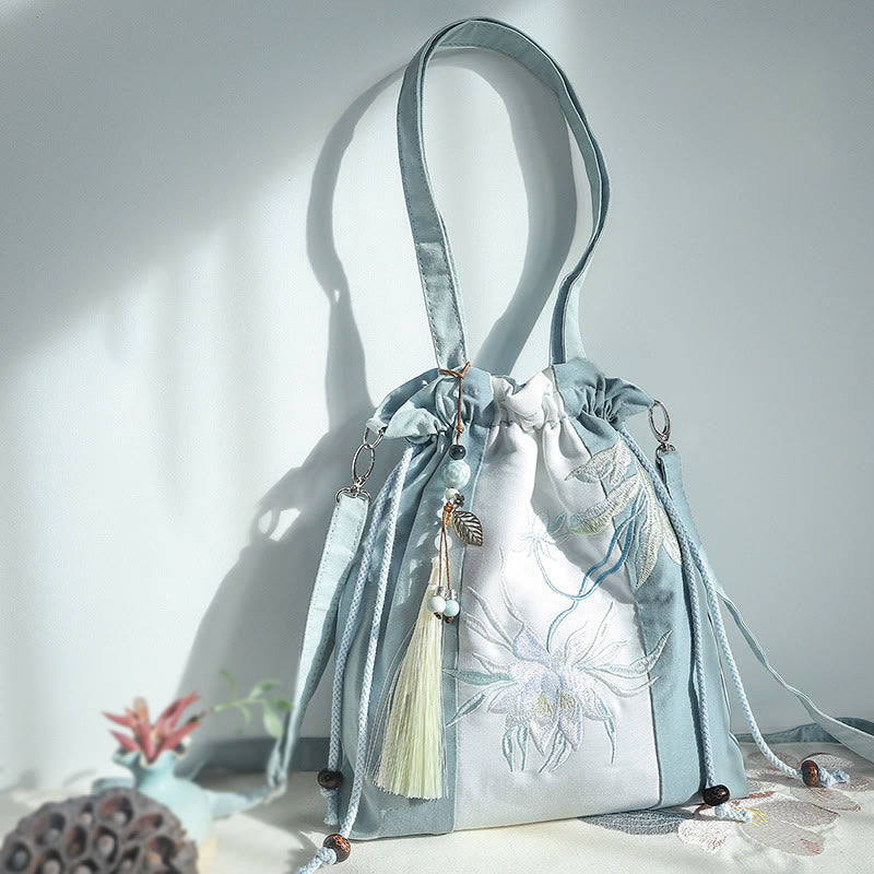 Bolso bandolera de lona con bordado de Buddha Stones, verde pera y epifilo azul.