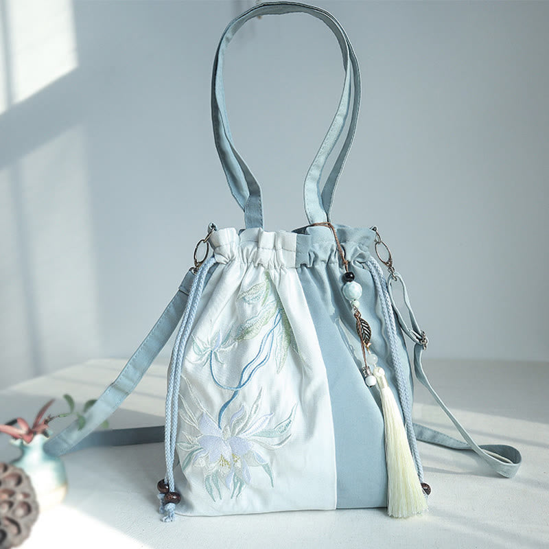Bolso bandolera de lona con bordado de Buddha Stones, verde pera y epifilo azul.