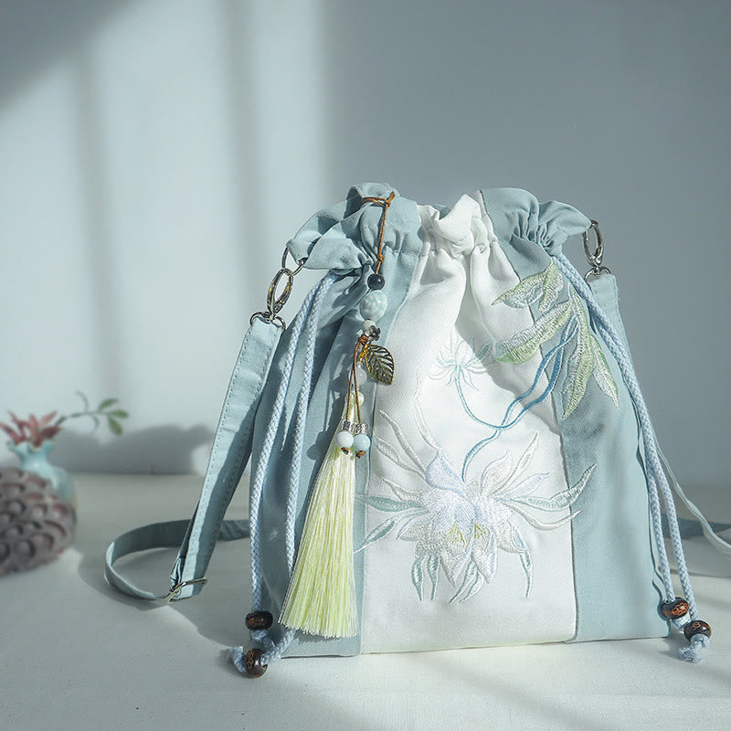 Bolso bandolera de lona con bordado de Buddha Stones, verde pera y epifilo azul.