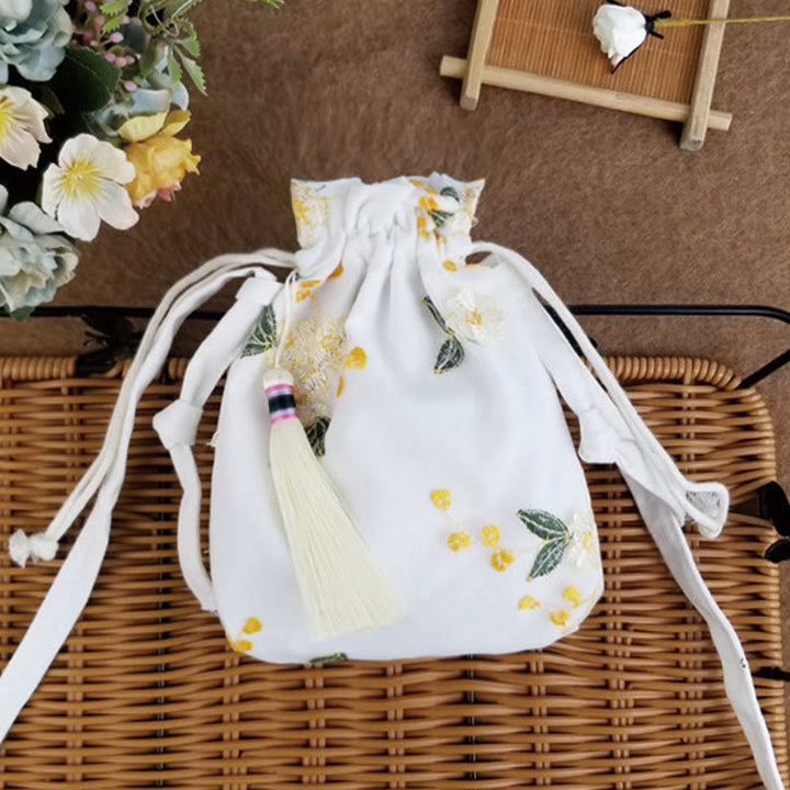 Bolso bandolera de lona con Buddha Stones , flores bordadas y flores de cerezo enredaderas.