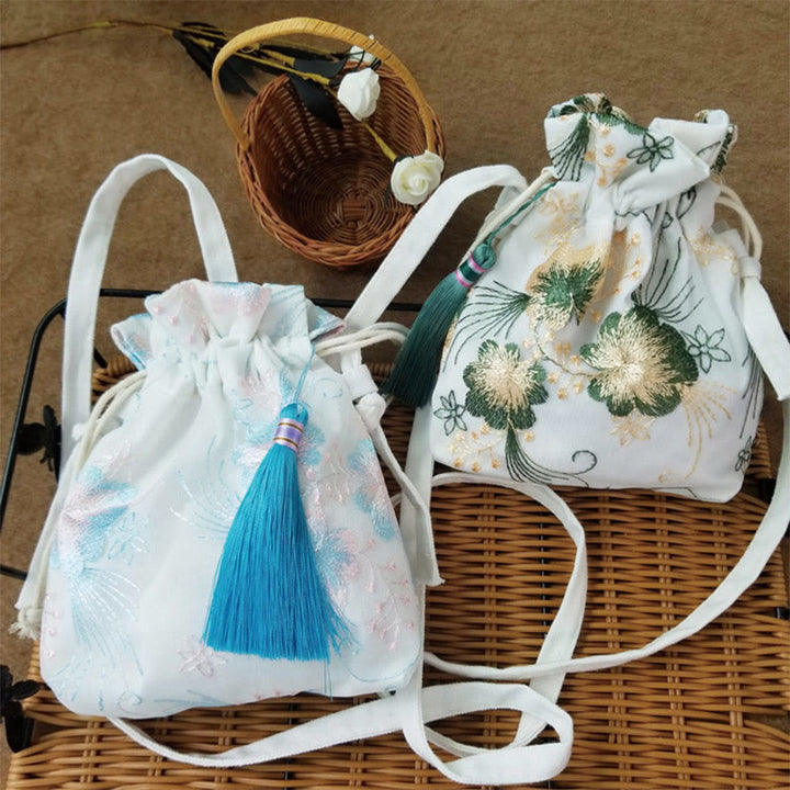 Bolso bandolera de lona con Buddha Stones , flores bordadas y flores de cerezo enredaderas.
