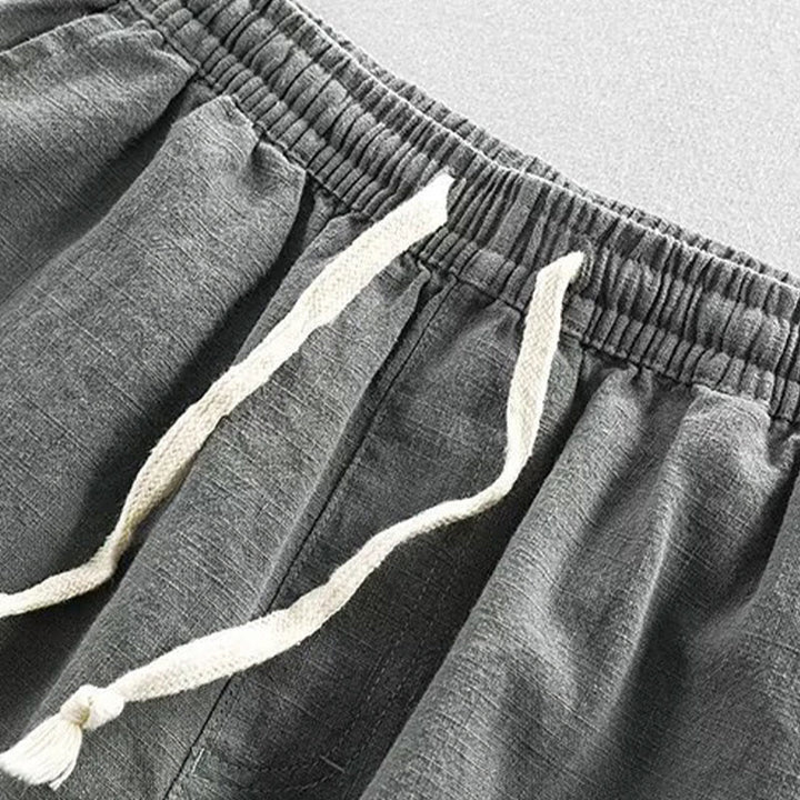 Pantalones cortos de algodón con cintura elástica y bolsillos para hombre con diseño de Buddha Stones - image 1