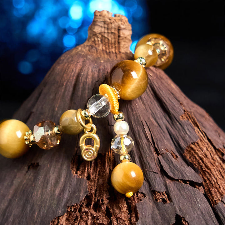 Pulsera de Buddha Stones con cuentas de ojo de tigre natural y peso resistente