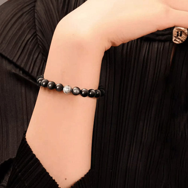 Pulsera de obsidiana con Buddha Stones y brillo plateado natural, protección Om Mani Padme Hum
