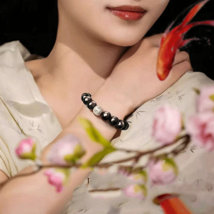 Pulsera de obsidiana con Buddha Stones y brillo plateado natural, protección Om Mani Padme Hum