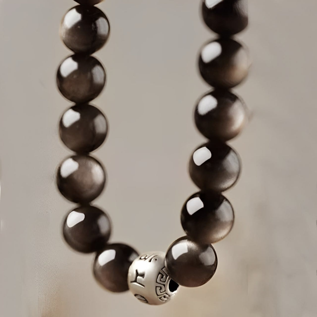 Pulsera de obsidiana con Buddha Stones y brillo plateado natural, protección Om Mani Padme Hum