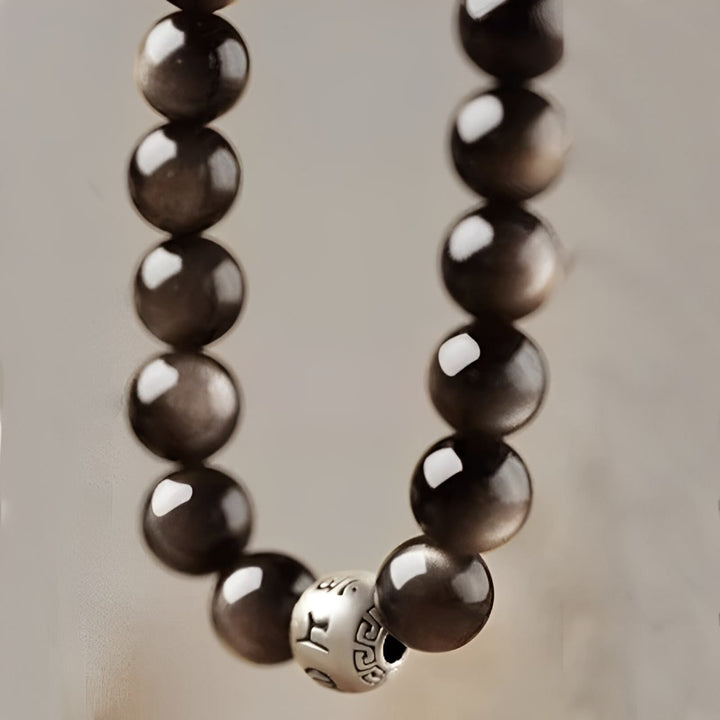 Pulsera de obsidiana con Buddha Stones y brillo plateado natural, protección Om Mani Padme Hum