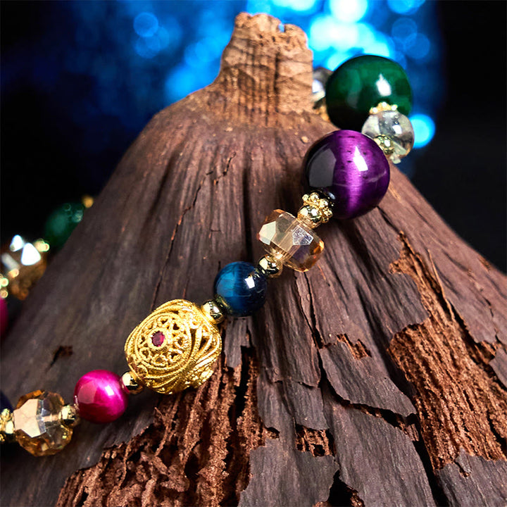 Pulsera de equilibrio de peso con piedra de ojo de tigre de color natural de Buddha Stones