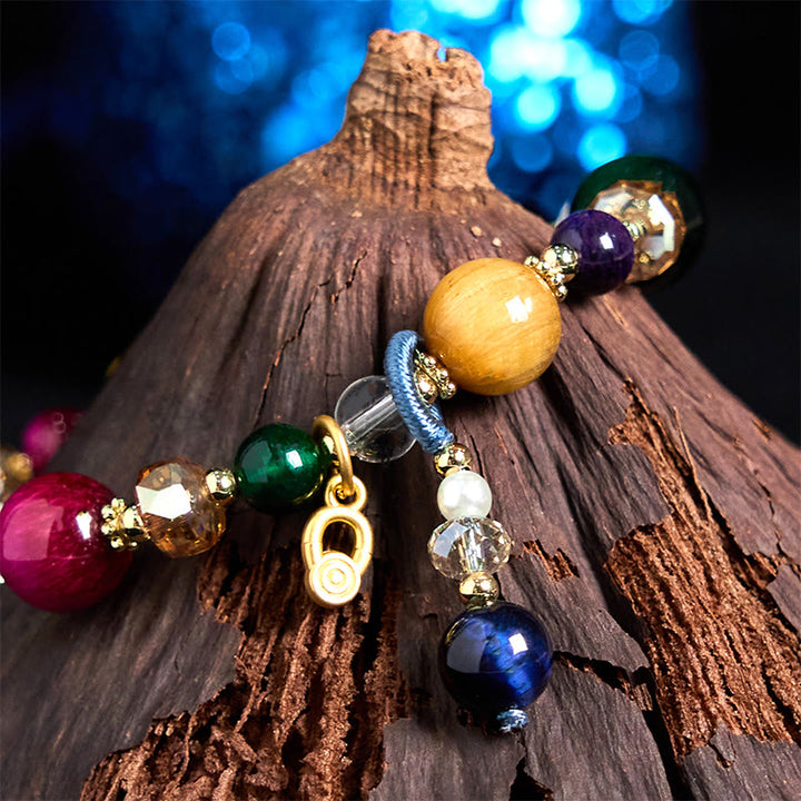 Pulsera de equilibrio de peso con piedra de ojo de tigre de color natural de Buddha Stones