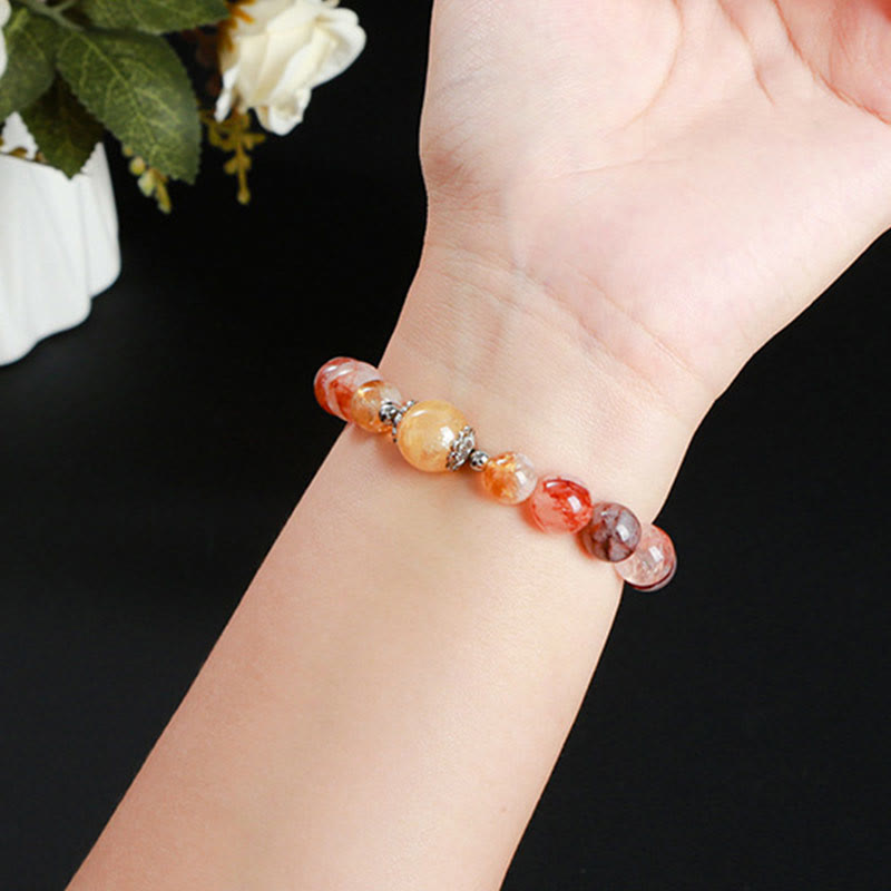 Pulsera de equilibrio con cuentas de cuarzo hematoide rojo natural de Buddha Stones