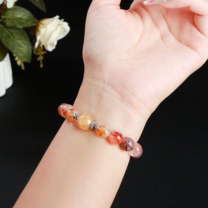 Pulsera de equilibrio con cuentas de cuarzo hematoide rojo natural de Buddha Stones