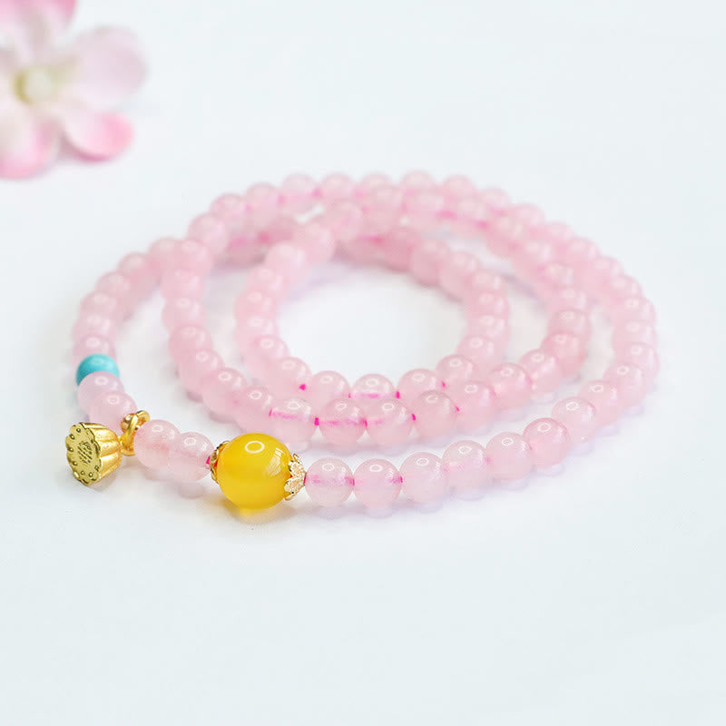 Pulsera de loto con cristales rosas y múltiples círculos de calcedonia amarilla y calidez de Buddha Stones