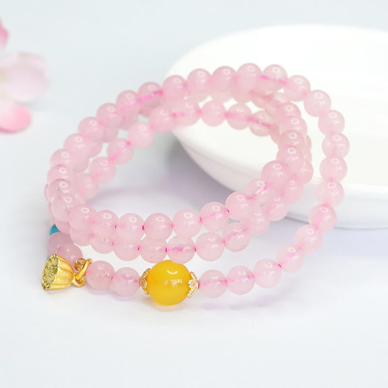 Pulsera de loto con cristales rosas y múltiples círculos de calcedonia amarilla y calidez de Buddha Stones
