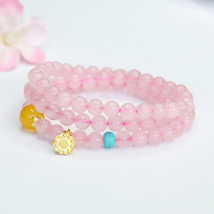 Pulsera de loto con cristales rosas y múltiples círculos de calcedonia amarilla y calidez de Buddha Stones