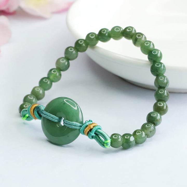 Pulsera de prosperidad con hebilla de paz y cuentas de jade de Buddha Stones